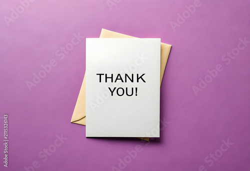 White thank you card with a...