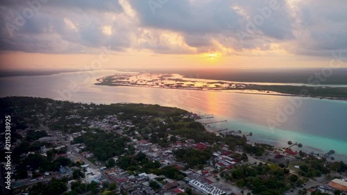 Panoramic sunrise over the iconic blue lagoon in Quintana Roo, Mexico