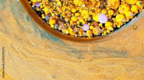 4K Gold Liquid Glitter Abstract Background. Flowing Fluid with Shimmering Particles, Macro Texture Video, 2160p