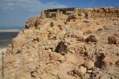 Masada is an ancient fortification in the Southern Israel situated on top of an isolated rock plateau, akin to a mesa. It is located on the eastern edge of the Judaean Desert