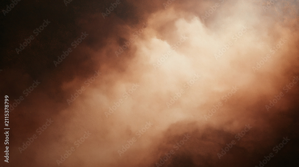 Obraz premium A view of soft golden brown clouds floating in the sky creating a warm and peaceful atmosphere during the golden hour of the day