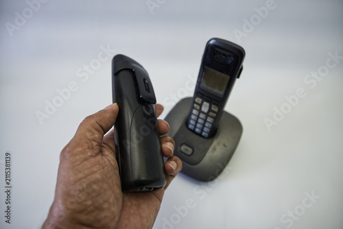 Black and white cordless landline phone