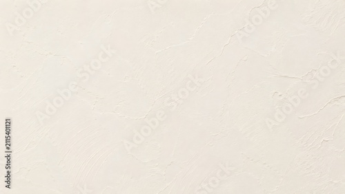 Light beige cream color textured plaster wall with a soft artistic brush stroke pattern surface