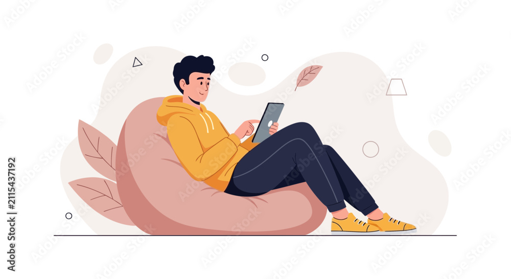 Fototapeta premium Modern flat illustration of a young man relaxing on a beanbag chair while using a tablet computer, vector art with abstract shapes and leaves