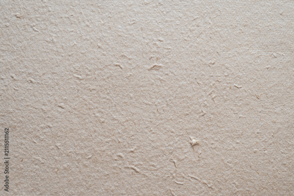 Obraz premium Beige Rough Handmade Paper Texture Background with Natural Fibers
