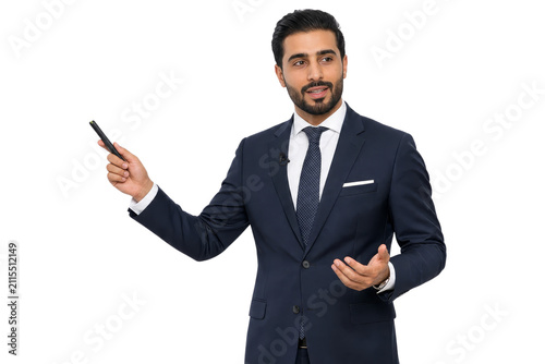 Confident Professional Businessman in Navy Suit Pointing and Presenting, News Anchor or Speaker Isolated