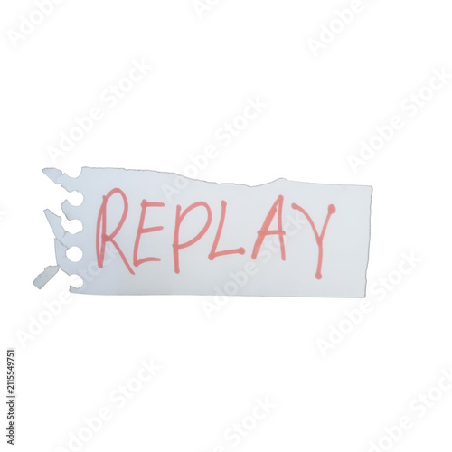 фотографія Replay word written in red marker on a torn piece of white paper isolated on tra