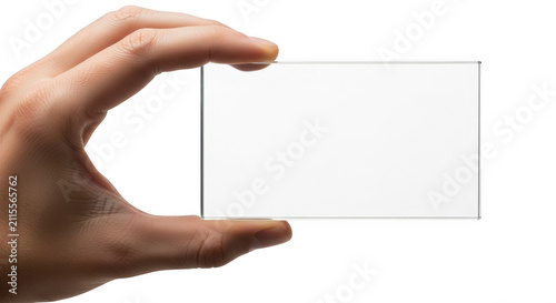 Person holding a blank white business card in hand isolated on transparent background