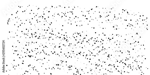 Abstract pattern of small dark squares scattered across a light background, creating a sense of digital noise or visual texture.