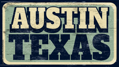 Aged retro Austin Texas sign on wood