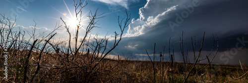Impacts of Climate Change. El Niño, the environment, rising global temperatures. Pollution and devastating storms featuring tornadoes and strong winds. Uncontrolled weather. Web banner, copy space.