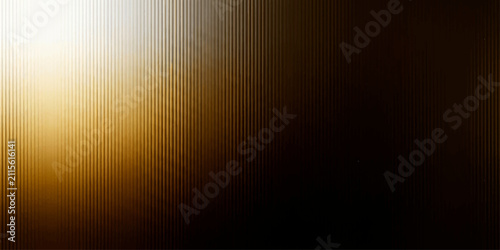 Foto Abstract metallic brushed texture with a gradient from golden light to deep shadow, creating a sense of luxury and depth