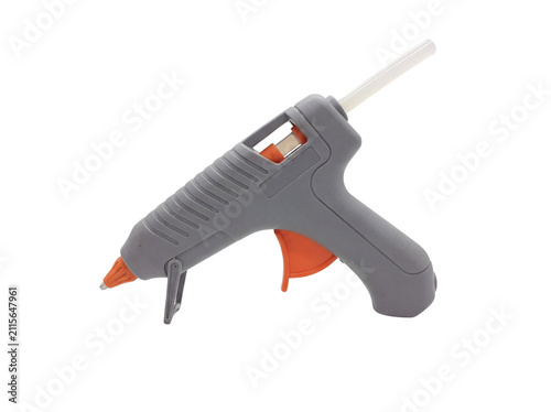 Gray and orange hot glue gun with a white stick on transparent background