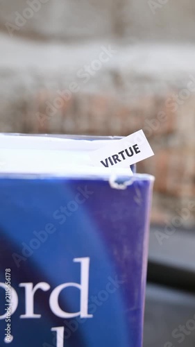 Virtue Word on White Paper Representing Integrity Character and Ethics