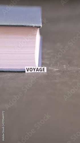 Voyage Concept on White Paper at Book Edge, Travel and Exploration Vertical Video