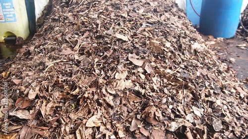 Pile of organic waste ready for composting, including food scraps and natural biodegradable materials.