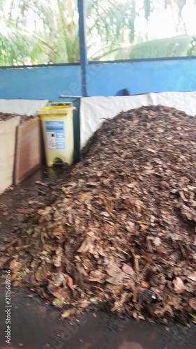 Pile of organic waste ready for composting, including food scraps and natural biodegradable materials.