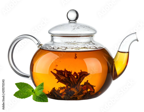 Glass teapot with aromatic herbal tea and fresh green mint leaves on black background
