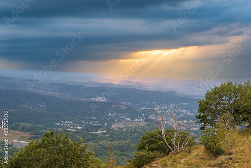View of the mountains and Kislovodsk from the observation decks of the Kislovodsk Park. Evening sunset over the mountains of Kislovodsk.