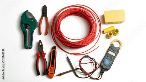 Top view equipment and tools for electrical wiring installation isolated background.