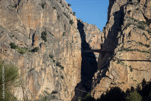 Caminito del Rey canyon trail with old concrete bridge Puente del Rey over deep river canyon, Spain, El Chorro.