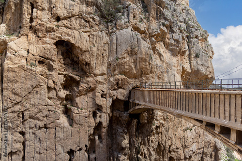 Caminito del Rey canyon trail with old concrete bridge Puente del Rey over deep river canyon, Spain, El Chorro.