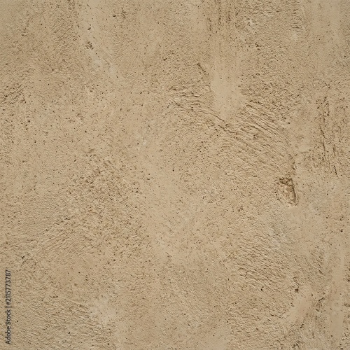 Textured Beige Wall Surface with Rough Plaster Finish for Background or Interior Design