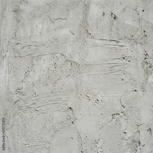 Textured Gray Concrete Wall Surface with Rough Finish and Cracks