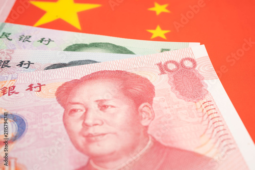 Obraz na płótnie China yuan banknote money with flag, investment economy business and banking