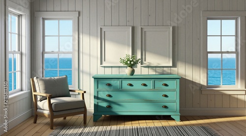 Interior room with turquoise dresser, armchair, and windows showing blue ocean. White paneled walls and wooden floor create a coastal style home decor. Light streams in.