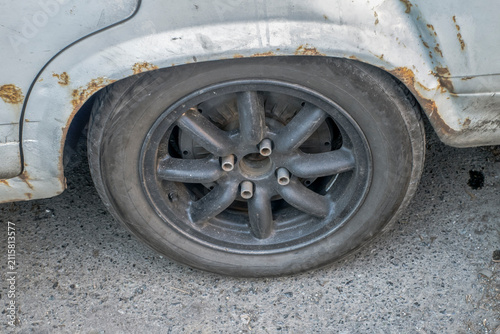 A fragment of an old parked car in close-up