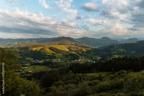 Scenic view of the Cantabrian landscape with rolling hills and lush greenery