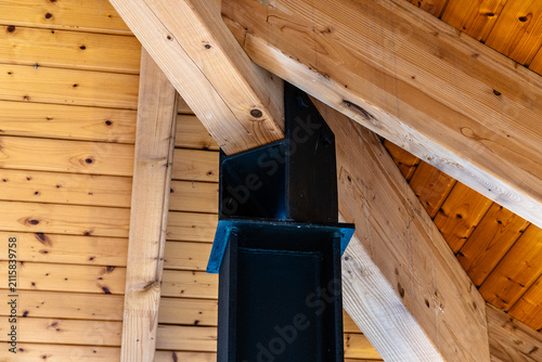 Wooden beams and a black metal support structure