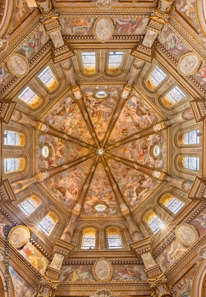 Fototapeta premium CREMA, ITALY - MARCH 20, 2026: The fresco of angels with the Crucifixion instruments in cupola of the church Santuario di Santa Maria della Croce by Giacomo Parravicino (1702).