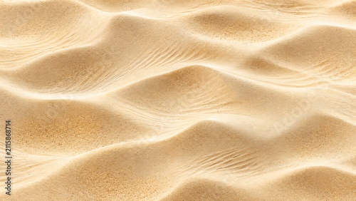 Abstract texture of golden desert sand dunes with soft light and smooth flowing wave patterns