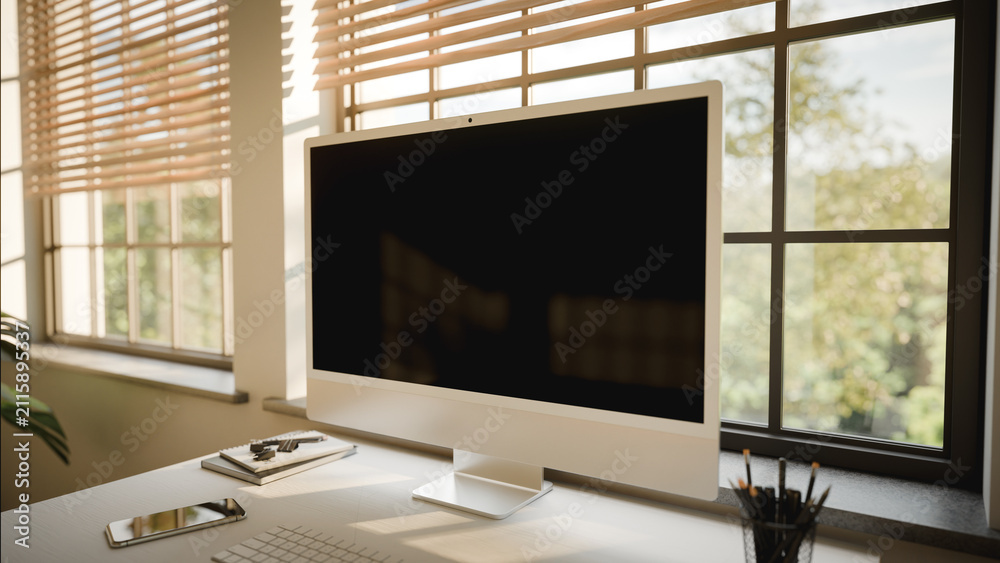 Fototapeta premium Computer Blank Screen Mockup in Sunlit Minimalist Home Office