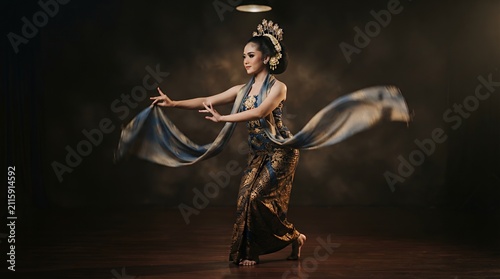Traditional Javanese Dancer Performing on Studio Stage