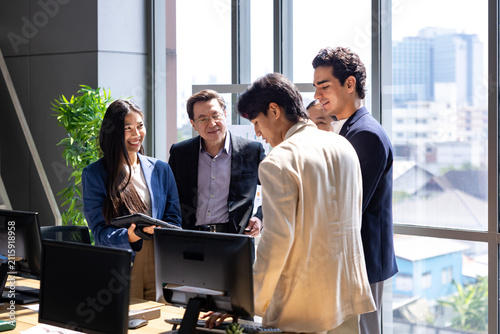 Team of young caucasian entrepreneur having a team meeting for project for marketing and sale management with skyscraper view for business startup and education usage