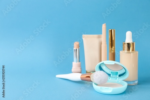 Cuadro en lienzo Bright Beauty Essentials Arranged On Blue Studio Surface.