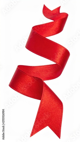 A vibrant red satin ribbon swirls and curls gracefully against a white background