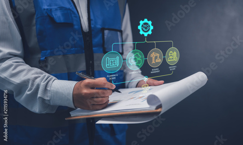 Construction collaboration concept engineer writing on clipboard showing project success workflow planning design communication resource management execution digital transformation B2B