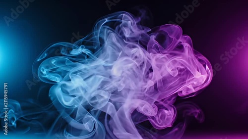 Swirling blue and purple smoke illuminated against a dark background