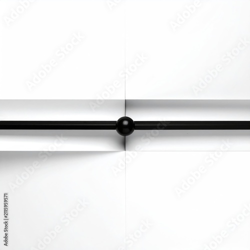 Minimalist scene of a black sphere centered on a black line against white folded paper