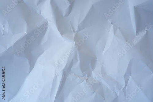 Crumpled White Paper Texture With Folds And Shadows