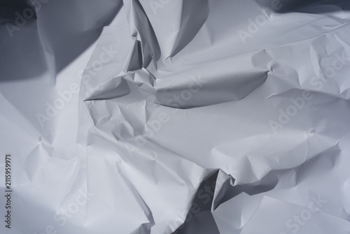 Crumpled White Paper Texture With Folds And Shadows