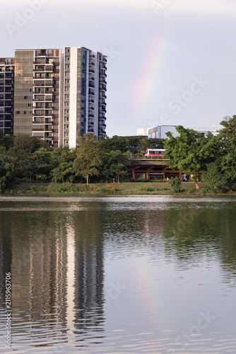 singapore skyline with rainbow and train