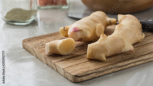 Ginger cut on a cutting board.