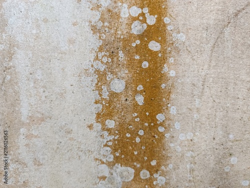 Canvastavla Close-up detail of a dirty weathered concrete wall texture with brown water stai