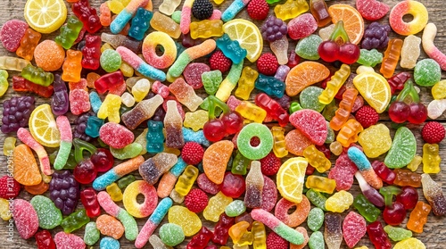 candy variety, a vibrant assortment of colorful gummy candies spread across a surface