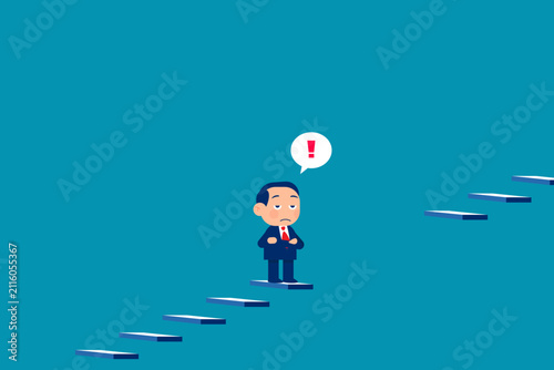 a gloomy man in a suit standing in the middle of the stairs that lead to the top and does not know where to move further because he has lost motivation